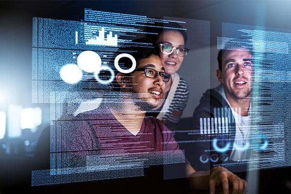 Engineers working on a computer